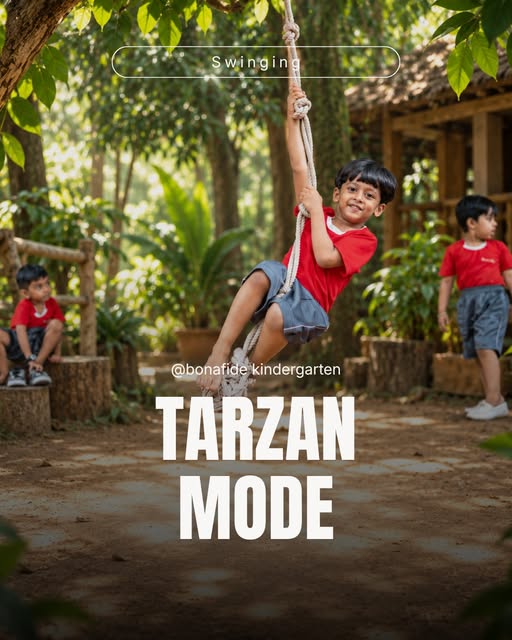 A smiling boy in a red shirt swinging on a rope in a shady garden